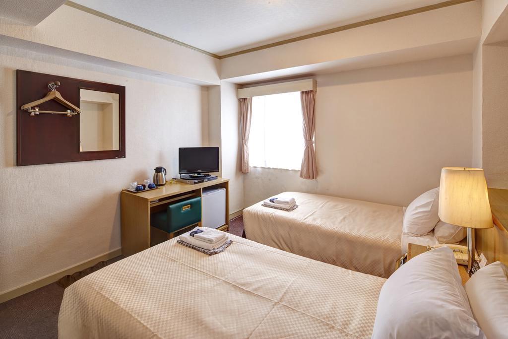 נאהא Okinawa Sun Plaza Hotel מראה חיצוני תמונה
