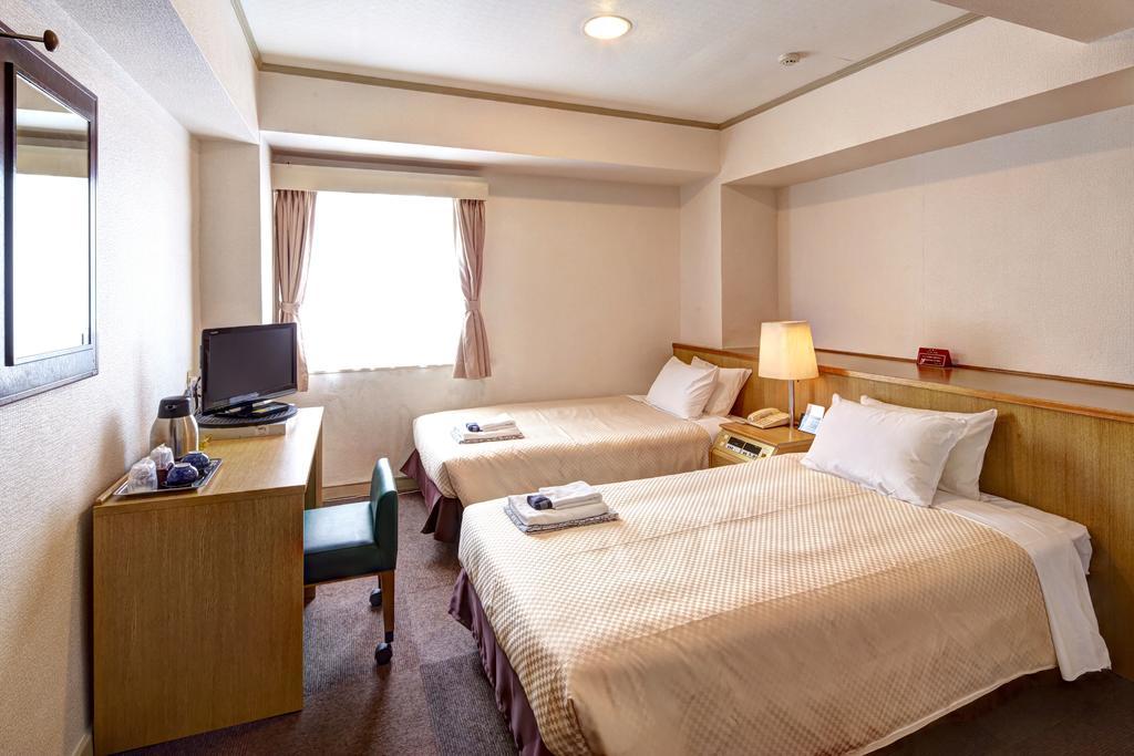 נאהא Okinawa Sun Plaza Hotel מראה חיצוני תמונה